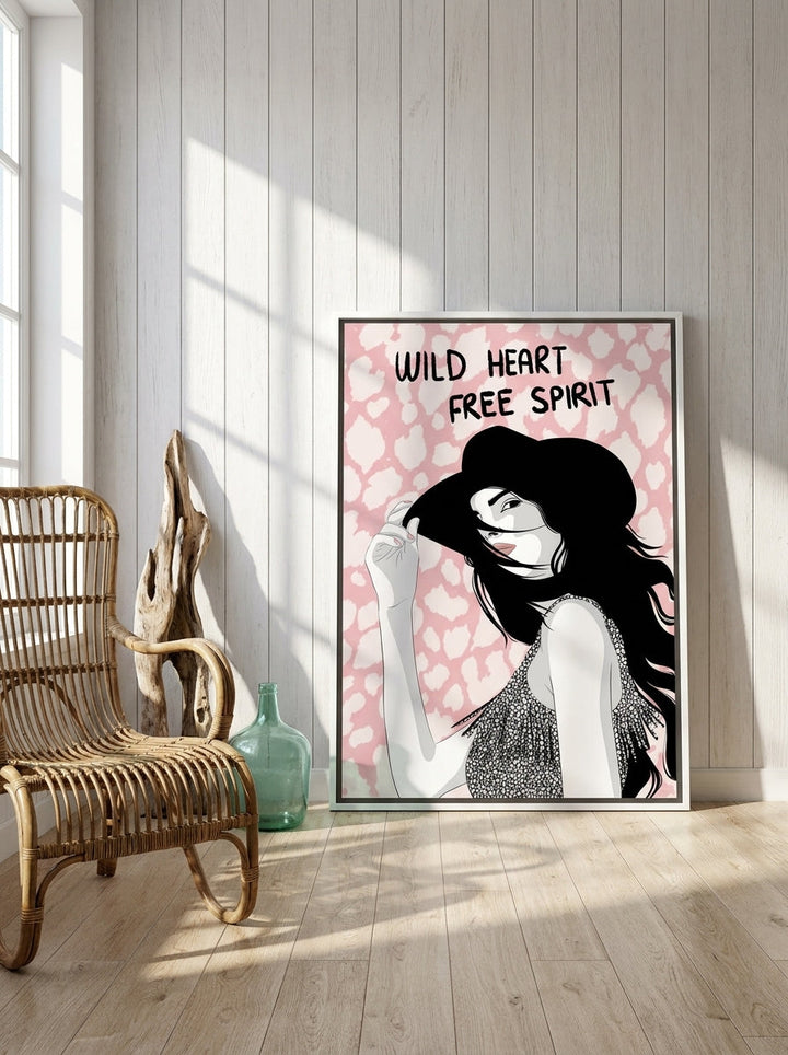 Canvas wall art with a white surround leaning against the wall in a coastal home office