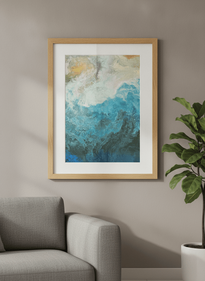 Modern wall art styled above a sofa in a neutral living room