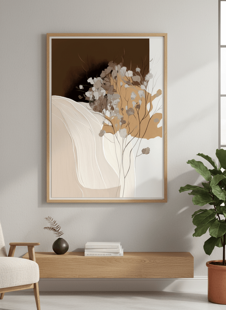 Modern wall art styled above a sofa in a neutral living room