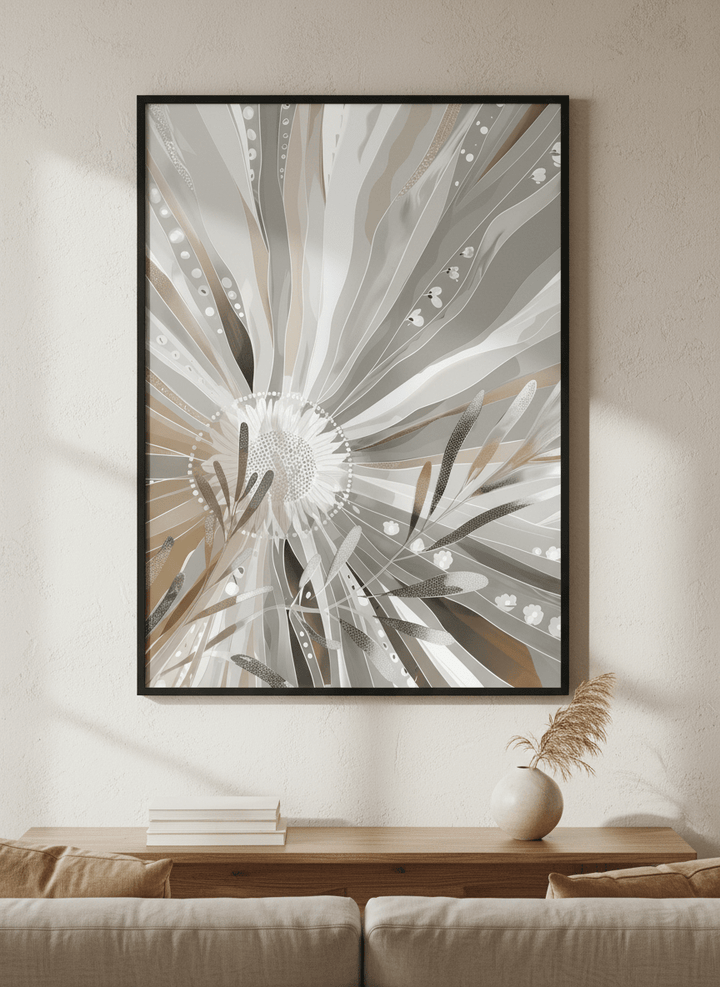 Modern wall art styled above a sofa in a neutral living room