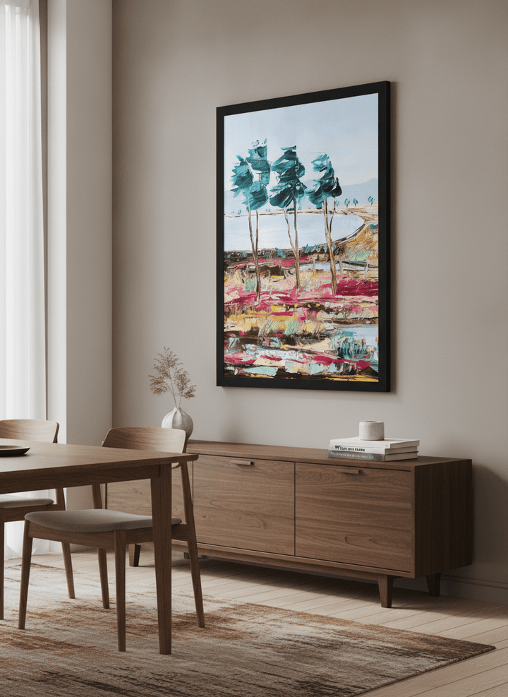 Wall art styled above a dining table in a contemporary home