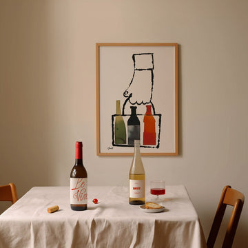 Wine Bottles Hanging in Hand By George Giusti - Style My Wall