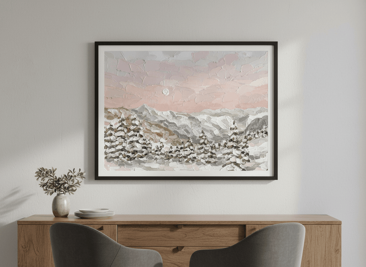 Wall art styled above a dining table in a contemporary home