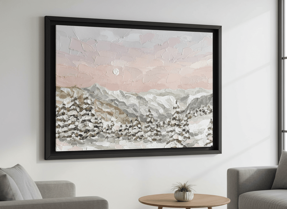 Modern wall art styled above a sofa in a neutral living room