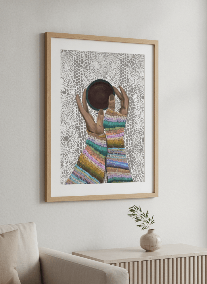 Modern wall art styled above a sofa in a neutral living room
