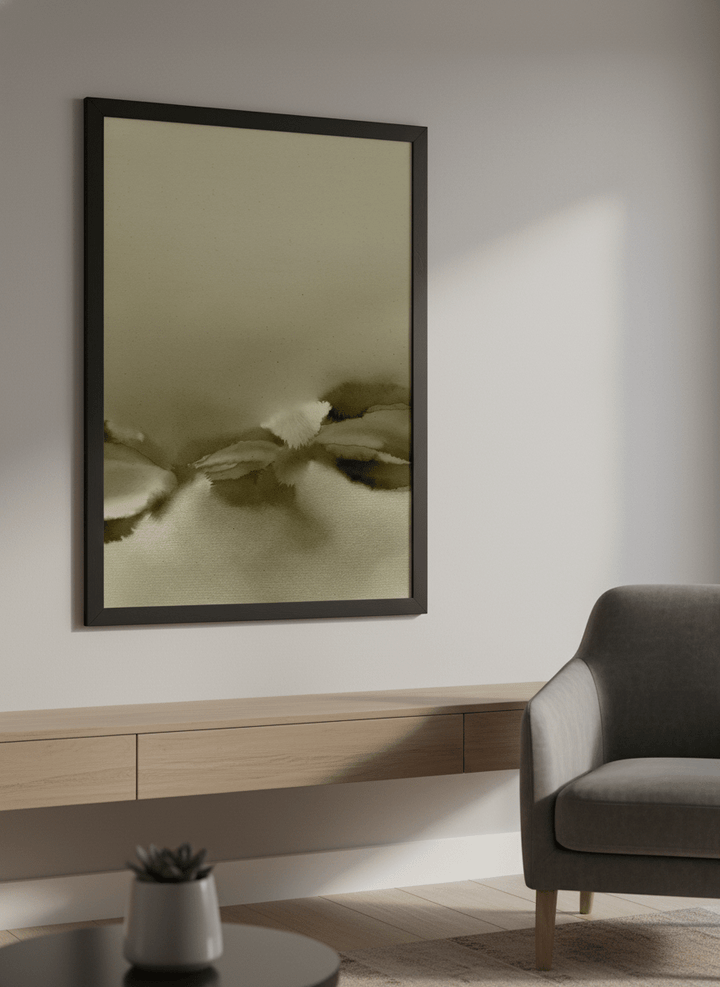 Modern wall art styled above a sofa in a neutral living room
