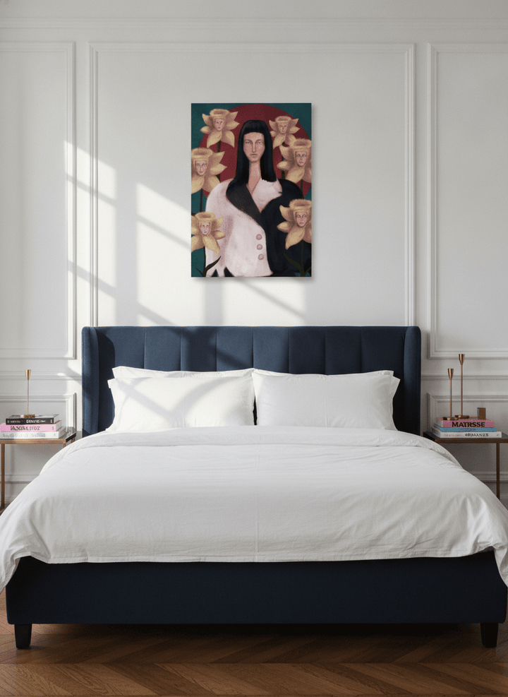 Stretched canvas wall art styled on the wall in a Parisian bedroom