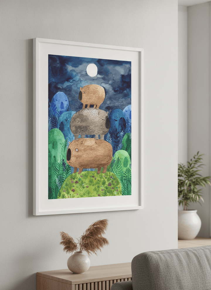 Modern wall art styled above a sofa in a neutral living room