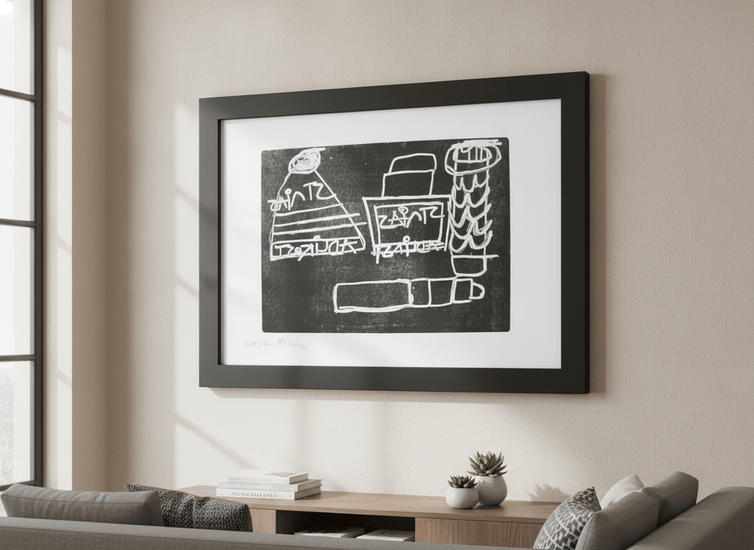 Modern wall art styled above a sofa in a neutral living room