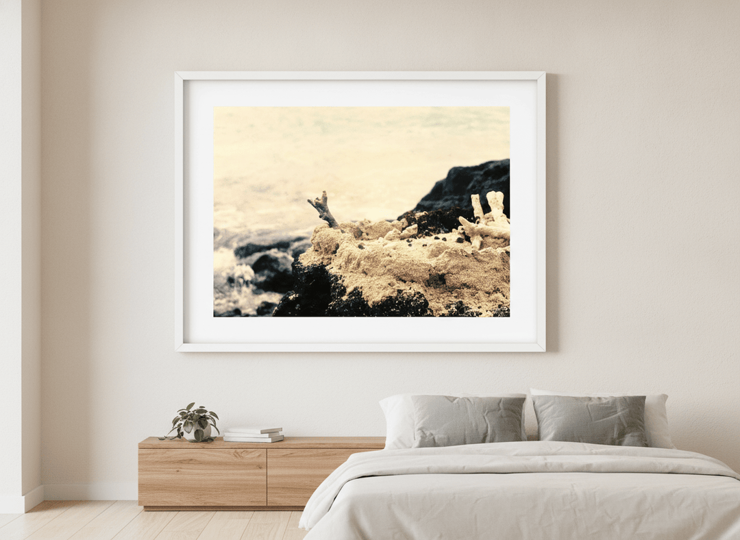 Minimalist artwork displayed in a calm, light-filled bedroom interior
