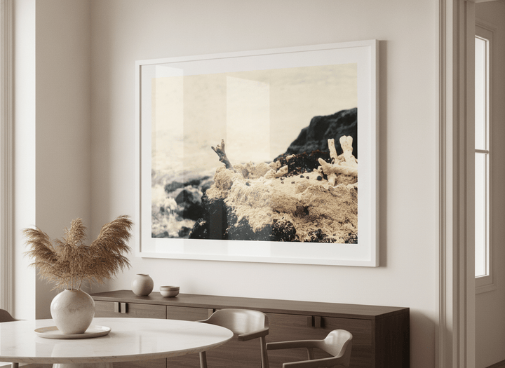 Wall art styled above a dining table in a contemporary home